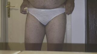 Hairy Black Guy trying on Teen Panties - 1 image