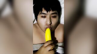 Good sucking rubber penis by young gay - 2 image
