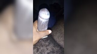 Jerking off with a condom - 1 image