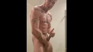 Hot guy with BWC flexing naked tattooed muscle! - 1 image