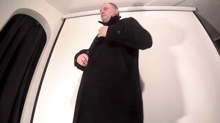 Kudoslong in long black coat undresses to show his semi-erect cock and balls in a steel ring and his leather collar - 2 image