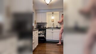 Unloading the dishwasher naked - 1 image