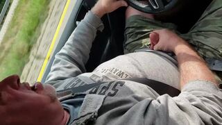 Bear jerks and cums in moving car - 1 image