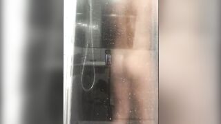 bubble butt rides a big dildo in the shower - 4 image