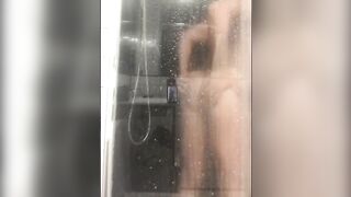 bubble butt rides a big dildo in the shower - 7 image