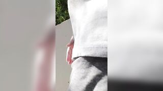 Walking down the street in summer, how hot! 1 - 5 image