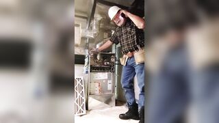 HVAC dad working on customer's heater - 2 image