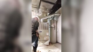 HVAC dad working on customer's heater - 4 image