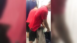 a beautiful man in the locker room of a store - 2 image