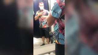 a beautiful man in the locker room of a store - 6 image