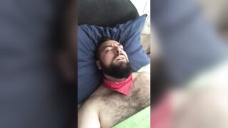 Big bearded and hairy bear wanking rubbing the bed sheet on his hard and wet cock. Beautiful Agony - 2 image