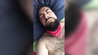 Big bearded and hairy bear wanking rubbing the bed sheet on his hard and wet cock. Beautiful Agony - 7 image