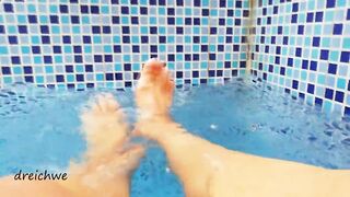 Feet in the pool with water - 3 image
