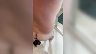 Black dildo in the shower - 7 image