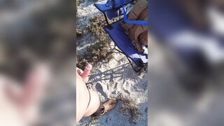 Ass spreading with a g-string and cockring all at the beach - 10 image