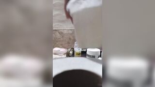 Boy close up Peeing on a cup, Trowing pee away then peeing again on the cup - 4 image