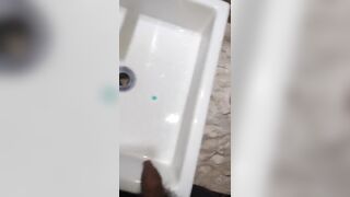 Boy close up Peeing on a cup, Trowing pee away then peeing again on the cup - 9 image