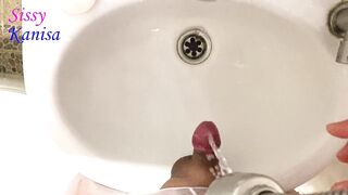 SisK peel off her penis and take a pee in sink - 6 image