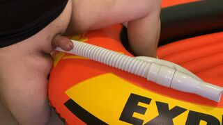 Fat Helmet Guy On Inflatable Boat Rubbing and Humping Vacuum Hose On Small Penis - 1 image