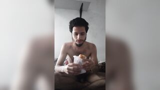 Naked guy Eating snacks to feed and grow my belly bulge that i usto have - 2 image