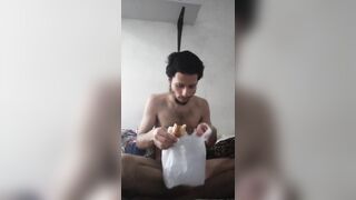 Naked guy Eating snacks to feed and grow my belly bulge that i usto have - 3 image