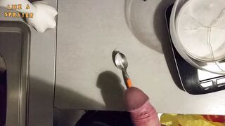 Handjob: jerking off over a little spoon - 1 image