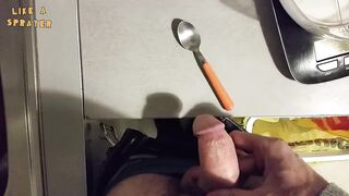 Handjob: jerking off over a little spoon - 2 image
