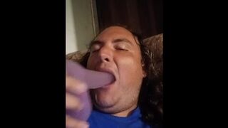 Sean teasing with a purple dildo - 1 image