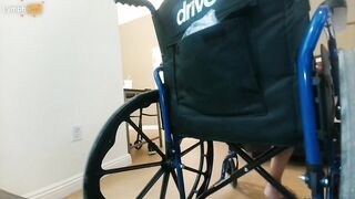 Handicapped guy wheels around hotel room naked in wheelchair - 8 image