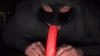masked cuckold sucking a dildo - 2 image