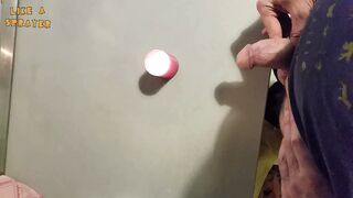 Homemade handjob and big load on a candle. Jerking off in a homemade amateur video, big cock and big load. - 1 image