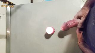 Homemade handjob and big load on a candle. Jerking off in a homemade amateur video, big cock and big load. - 10 image