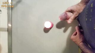 Homemade handjob and big load on a candle. Jerking off in a homemade amateur video, big cock and big load. - 6 image