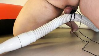 Small Penis With Vibrator Eggs Holding A Vacuum Hose - 9 image