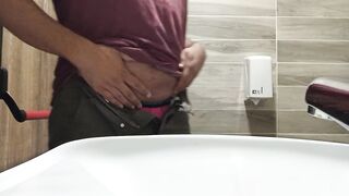 long pee like fountain in a public toilet - 2 image