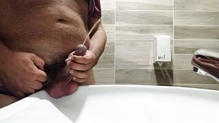 long pee like fountain in a public toilet - 7 image