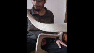Video of model in chair peeing hardly - 1 image