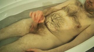 Horny Scottish guy taking a bath. Uncut masturbation and cumming on hairy chest - 8 image