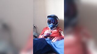 motorcyclist jerks off in new gear and cums on sneakers. - 2 image