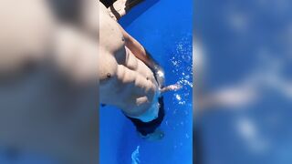 Risky showing my boner in swimming pool while neighbors outside - 2 image