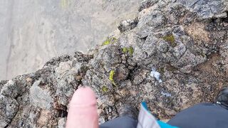 Cliffwanker - Felixproducer wanks on a rock and shoots his sticky load of sperm down that cliff - 10 image