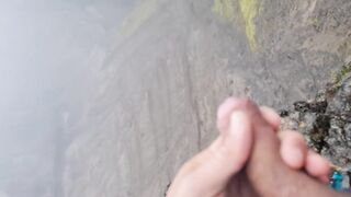 Cliffwanker - Felixproducer wanks on a rock and shoots his sticky load of sperm down that cliff - 3 image