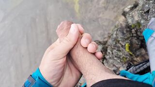 Cliffwanker - Felixproducer wanks on a rock and shoots his sticky load of sperm down that cliff - 4 image