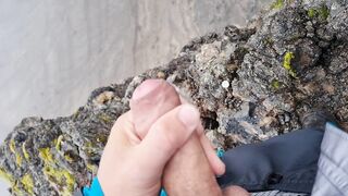Cliffwanker - Felixproducer wanks on a rock and shoots his sticky load of sperm down that cliff - 9 image