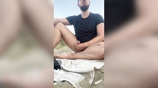 Playing on the beach in speedos. - 8 image
