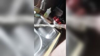 Sean pisses into the sink - 6 image