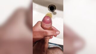 I piss in a condom while getting horny and I ejaculate in my piss with my big cock - 9 image