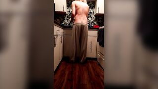 Pants slowly fall down while doing dishes - 4 image