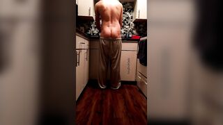 Pants slowly fall down while doing dishes - 7 image