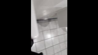 play in front of the urinal. - 1 image